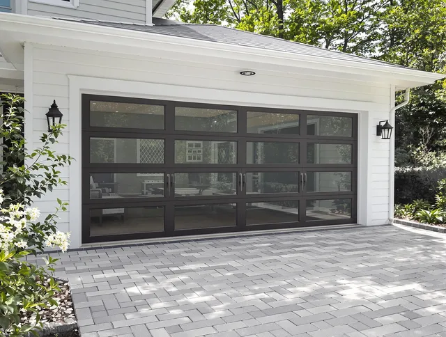Newtown Garage Door Repair design specialist presenting custom garage door options to Newtown homeowner