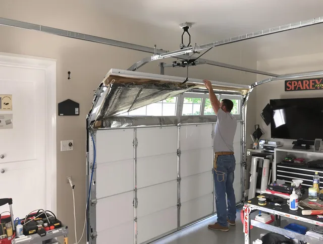 Garage door section replacement by Newtown Garage Door Repair in Newtown